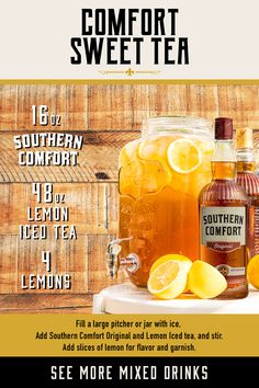 a bottle of southern comfort tea next to lemons and a glass of iced tea