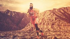 a basketball player is running in the mountains