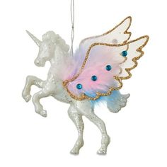 an ornament shaped like a unicorn with wings