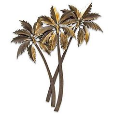 two metal palm trees with brown leaves