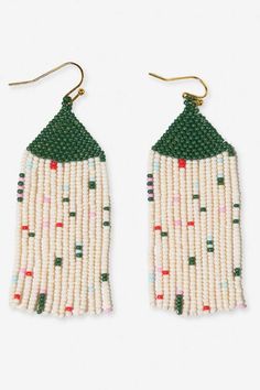 Make a stylish bohemian statement with these eye-catching fringe earrings. The Agnes Confetti Beaded Fringe Earrings feature an intricate mix of seed beads hand-strung into long, cascading strands. These lightweight yet striking earrings blend earthen tones with playful pops of bright hues for a cool, casual vibe. The confetti-inspired pattern adds artful visual interest and movement. Whether paired with a breezy bohemian dress or elevating a simple jeans-and-tee look, these fringe earrings brin Toddler Girl Toys, Fringe Earring, Beaded Fringe Earrings, Cocktail Kits, Human Hands, Perfume Gift Sets, Grad Gifts, Beaded Fringe, Fringe Earrings