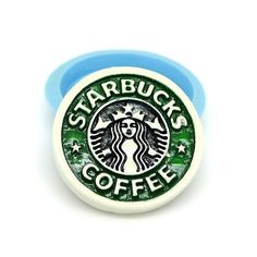 a starbucks coffee cup with the words starbucks's coffee on it in green and blue