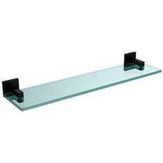 a glass shelf with two black brackets on it