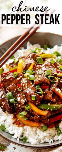 chinese pepper steak served over white rice with chopsticks on the side in a bowl