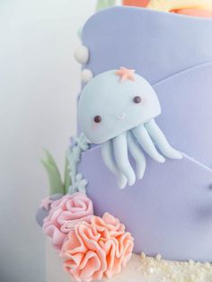 a close up of a cake with an octopus on it