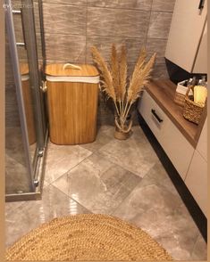 a bathroom with a basket and toilet in it