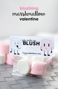 marshmallows wrapped in cellophane on top of a keyboard with the words, you make me blush happy valentine's day