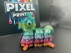 there is a small toy made to look like a caterpillar