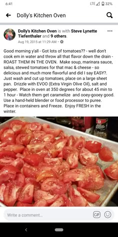 a pan filled with sliced tomatoes on top of a counter