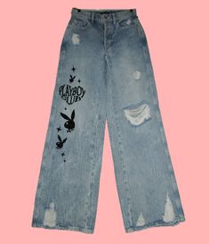 BRAND: Playboy by Pacsun SIZE: 22 (waist measures 23") CONDITION: New with tags DETAILS Playboy brings eco-friendly styles to your rotation, including the new Super Distressed High Waisted Baggy Jeans. These high-rise jeans rock super distressed details throughout, Playboy graphics down the leg, and sit high on the waist with an ultra-slouchy relaxed leg. Light blue wash Destruction details Playboy graphics 5-pocket body 5-button closure FABRIC: 100% sustainably-sourced cotton WAIST: measures 23 Wide Leg Baggy Jeans, High Waisted Baggy Jeans, Star Aesthetic, Clothing Pieces, Jeans Y2k, Eco Friendly Fashion, Shooting Star, Jeans Rock, High Rise Jeans