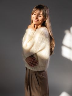 The precious mohair and organic wool blend together to create a simple, yet timeless sweater. Featuring an oversized fit and a boxy shape, it gives warmth and beauty with a hint of luxury. Made of voluminous, chunky yarn, with a slightly teddy bear texture. Each sweater is lovingly handmade, showcasing exceptional attention to detail, and a final piece just as unique as you are. This product is aligned with the best practices in Animal Welfare. Details Handcrafted• raspberry• flurry, voluminous mohair• extra softness and lightness• drop shoulders• composition: 59% mohair, 41% organic wool• cruelty free mohair, organic wool• the wool comes from sheep reared in biological farms and free from any mulesing treatment• premium Italian yarn, produced with a low environmental impact cycle• made in Mohair Jumpers, Woman Sweater, Handmade Knitwear, Fluffy Sweater, Camel Sweaters, Alpaca Sweater, Thick Sweaters, Knitwear Fashion, Fuzzy Sweater