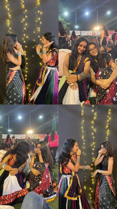 two women are hugging each other in front of a crowd at an event with lights on the wall behind them