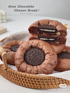 some cookies are sitting in a basket on a table with the words oreo chocolate cheese bread