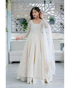 Trendia brings you this White Anarkali suit set with Skirt & Dupatta by the brand Label Shaurya Sanadhya. This round necked fitted dress with flared hem is at ankle length with White Chanderi cane-cane skirt. White Anarkali Kurta comes in Threadwork work & sequin work with White Dupatta in Net and threadwork. Accompanied by White Chanderi Skirt with elasticated slip on waistband work is simply a must have. The Anarkali Suit set comes with 3/4th sleeves style. Check out the photos of the product अनारकली सूट, Frock Suit Design, Shaurya Sanadhya, डिजाइनर कपड़े, Anarkali Dress Pattern, Traditional Indian Dress