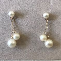 14k Solid Gold Vintage From 1960s Pearl Earrings. The Largest Pearl Is 7 1/2 Mm The Middle Is 5mm And The Top Is 4mm. These Pearls Are Totally Round Not Like Modern Pearls Which Have Flatness Or Not Round. Years Ago Only The Rounds Were Made Into Jewelry. These Pearls Are Creamy White But Not The Discolored Cream That So Many Vintage Pearls Have. Substantial Earring Backs, These Backs Are Not Skimpy. Earring Backs Stamped 14k And Earrings Tested To Be 14k With Gold Tester. Comes From A Smoke Fre Gold Pearl Earrings, Vintage Pearls, Gold Pearl, Creamy White, Earring Backs, Larp, Pearl Jewelry, Solid Gold, Vintage Jewelry