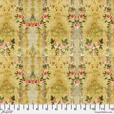 an old fashioned wallpaper with roses and leaves on yellow background, as well as a ruler