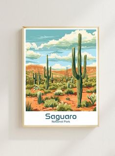 the saguaro national park poster is displayed on a wall