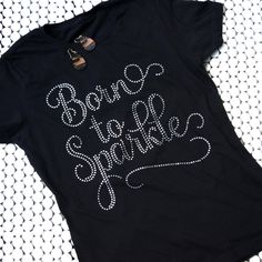 At Back to the South Bling, we believe in celebrating your curves and embracing confidence with every step you take. Our Women's Cut Bling T-Shirts are designed to complement your figure, offering a closer fit that accentuates your unique silhouette. Say goodbye to oversized, shapeless tees – it's time to flaunt what you've got! 🌟 Unleash Your Inner Sparkle: Whether you're rocking yoga pants while running Saturday morning errands or curating the perfect date night ensemble from your closet, our I Dont Swear I Sparkle Shirt, Sparkly Clothes, Cut Shirt Designs, Rhinestone Tshirts, Born To Sparkle, Sparkly Outfits, Bling Shirts, Cut Shirt, Perfect Date