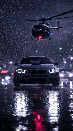 A sleek, black BMW sedan roars through a stormy night, its headlights piercing the darkness as a menacing helicopter hovers overhead. Bmw Sedan, Black Bmw, Stormy Night, The Darkness, Cool Wallpaper, Sport Cars, Helicopter, Cool Cars