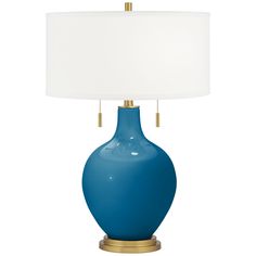 Bring exquisite style and designer color home with the Toby Color Plus table lamp in beautiful Mykonos Blue. The design is hand-crafted by experienced artisans in California, and is completed by an elegant brass finish base and pull chains. A plain drum shade sits on top, drawing the look together in contemporary style. Lamp base U.S. Patent # 8,899,798. Blue Lamp Base, Summer Bedroom Decor, Brass Accent Table, Top Drawing, Living Room Lighting Tips, Blue Table Lamp, Color Home, Blue Lamp, Coastal Modern