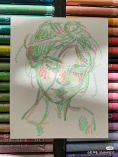 a drawing of a person with colored crayons in the background