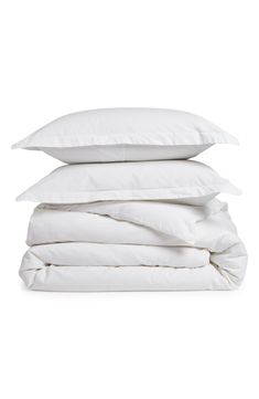 three pillows stacked on top of each other