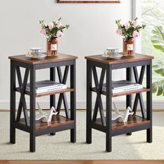 two black end tables with flowers on each side and one shelf holding magazines, coffee mugs and other items