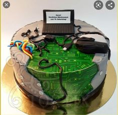 a cake decorated with electronic components and wires