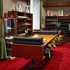 a room with many different types of cloths on the tables