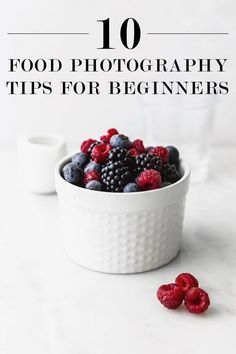 berries and raspberries in a white bowl with the words 10 food photography tips for beginners