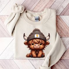 Free Shipping Orders Over $35  Highland Cow Sweatshirt, Highland Cow Crewneck, Cute Cow Hoodie, Western Crewneck, Highland Cow Shirt, Cow Gifts, Cow Shirt c30 HOW TO ORDER 1. Choose Color 2. Select Size from drop down menu - SUBLIMATION FILM is to Print design on your own apparel. We will ship Ready To Press Film Shown In the Video.  DETAILS - 1x1 ribbed collar, cuffs and waistband with spandex - Pill-resistant air jet yarn - Set-in sleeves - Double-needle stitching throughout CARE INSTRUCTIONS Amigurumi Lovey, Amigurumi Cow Pattern, Western Crewneck, Cow Hoodie, Cow Crochet, Cow Baby Showers, Baby Highland Cow, Tutorial Amigurumi, Amigurumi Cow