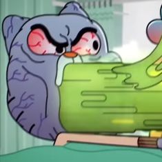 an animated image of a cat sleeping on top of a green bed with another cat in the background