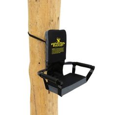 a chair that is attached to a wooden pole