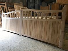 a large wooden gate sitting in the middle of a room