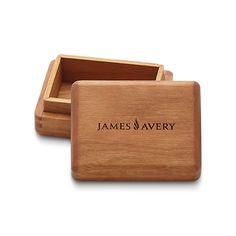 two wooden boxes with the name james avery on them