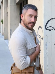 Jonny Cota's signature Leather Bandeau bag, styled with our Oversized Pocket Shirt in Tan Pocket Shirt, One Shoulder, Purse, Embroidery, Zipper, Leather