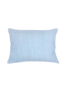 a light blue pillow on a white background