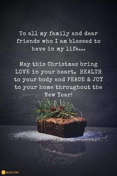 a piece of cake sitting on top of a table next to a christmas card with the words, to all my family and dear friends who i am pleased to have in my life