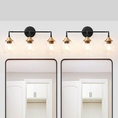 three light bathroom vanity with mirrors and lights