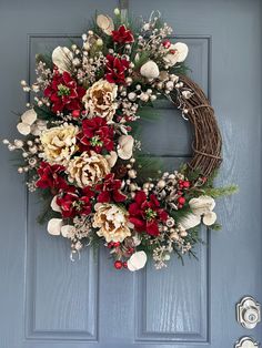 a wreath is hanging on the front door