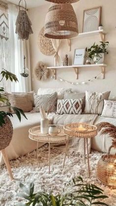 A living room corner. Couch with pillows, thick wool carpet on the floor, rattan basket and two round rattan tables on the carpet. Shelves on the wall with plants, a decorative flask, statuettes and frames with art. A window with a macrame hanging and a curtain, round rattan wall decorations. All in shades of off-white and beige. Room Inspo Boho, Boho Living Room Inspiration, Grey Couch Living Room, Boho Styl, Living Room Living Room, Home Decor Ideas Living Room, Casa Vintage