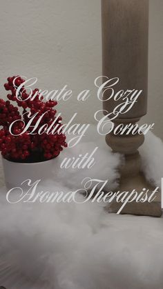 a candle and some white feathers with the words create a cozy holiday corner with aroma therapy