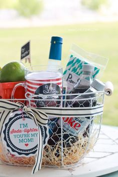 a basket filled with drinks on top of a table