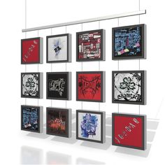 a group of framed pictures hanging on a wall next to each other with graffiti written all over them