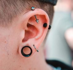 a man with ear piercings on his ears