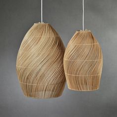 two wooden lamps hanging from the ceiling