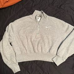 Brand New Condition Nike Half-zip Winter Top, Nike Winter Half-zip Top, Nike Sweater For Winter Loungewear, Nike Winter Sweater For Loungewear, Nike Winter Loungewear Sweater, Nike Gray Tops For Fall, Nike Crew Neck Outerwear For Fall, Nike Long Sleeve Spring Sweatshirt, Trendy Nike Long Sleeve Sweatshirt