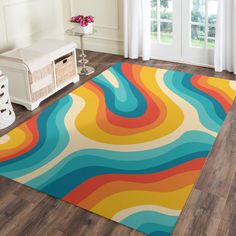 a brightly colored area rug in a living room