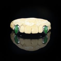 Price shown reflects the price per tooth.SELECT HOW MANY JADE TEETH BY ADDING QTY IN YOUR SHOPPING CART.Send us an DM or Message to notify us of any custom requests.Metal color available in Yellow Gold, White Gold, Rose Gold or Black Gold. All gold options are 14K. Jade grillz are hand carved and require on average 1-4 White Gold Grillz Men, Gold Fang Grillz, Gap Grillz, Vampire Grillz, White Gold Grillz, Fang Grillz, Silver Grillz, Imperial Jade, Custom Grillz