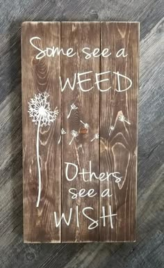 a wooden sign that says, some seed weld others wish on the side of it